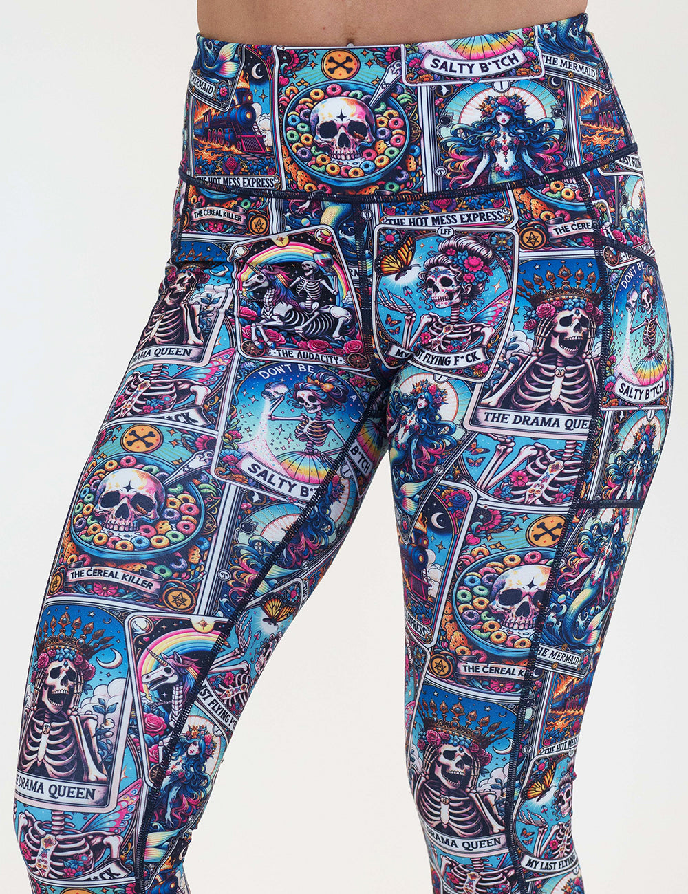 front of the tarot cards print leggings against a white background
