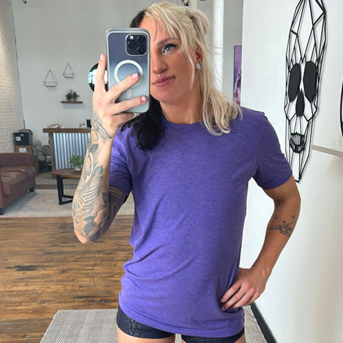 model wearing the purple basic unisex shirt