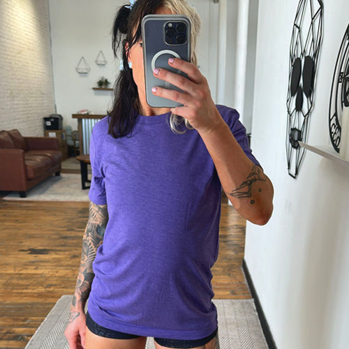 model wearing the purple basic unisex shirt