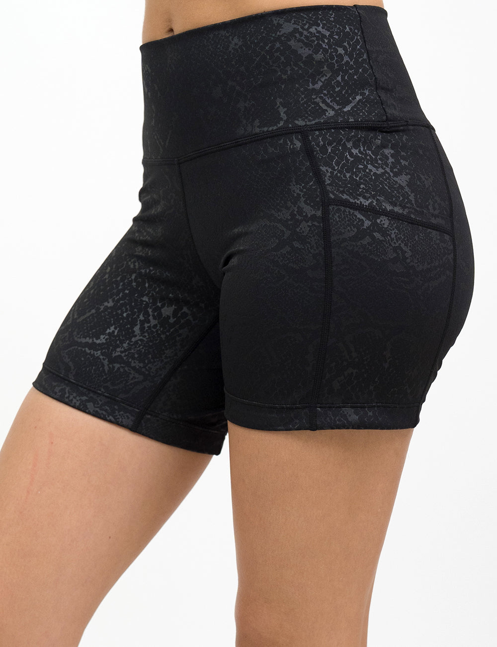 front of the 5 inch dark python print shorts against a white background