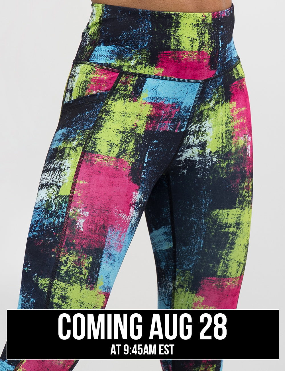 front of the green, pink, and blue grunge pattern leggings, coming august 28th