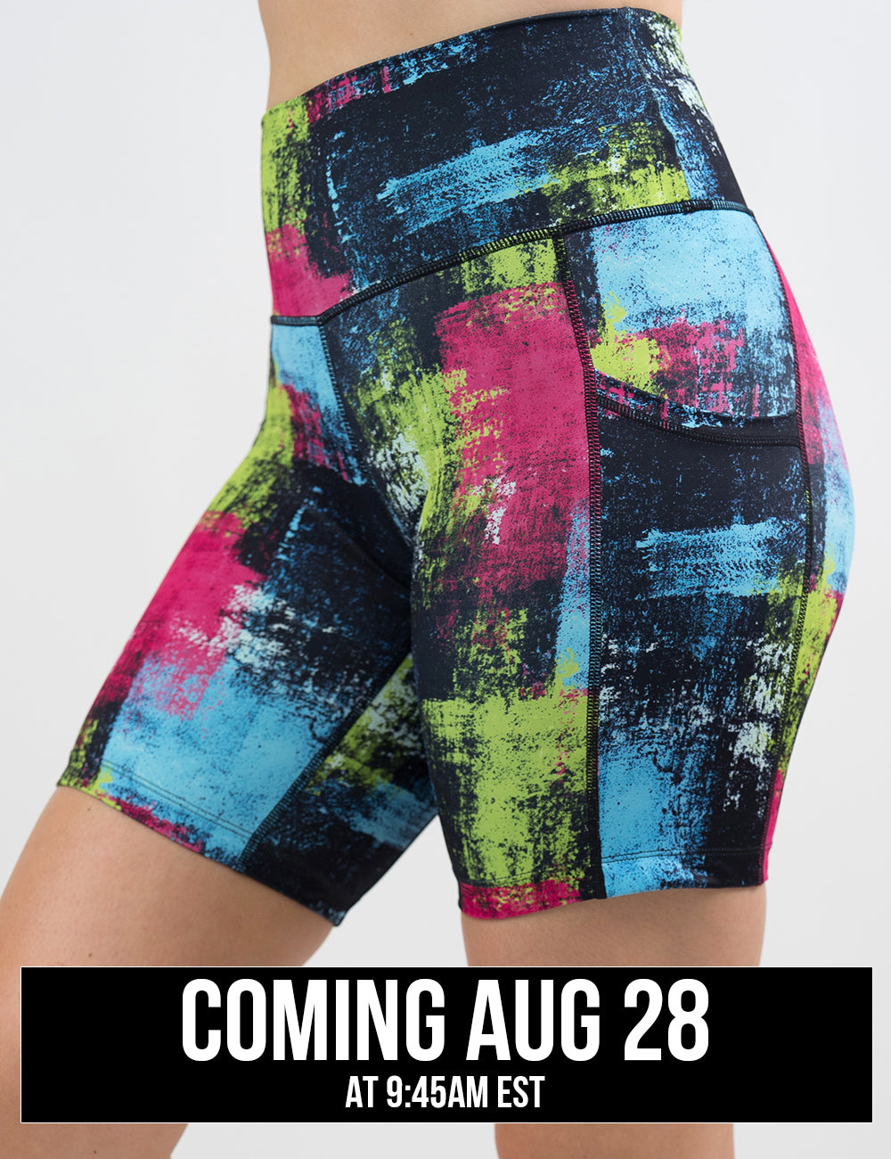 front of the green, pink, and blue grunge pattern 7 inch shorts, coming august 28th