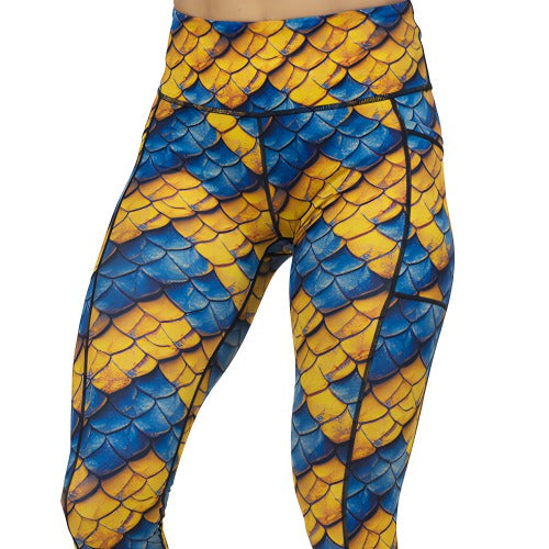 blue and yellow dragon scale print leggings
