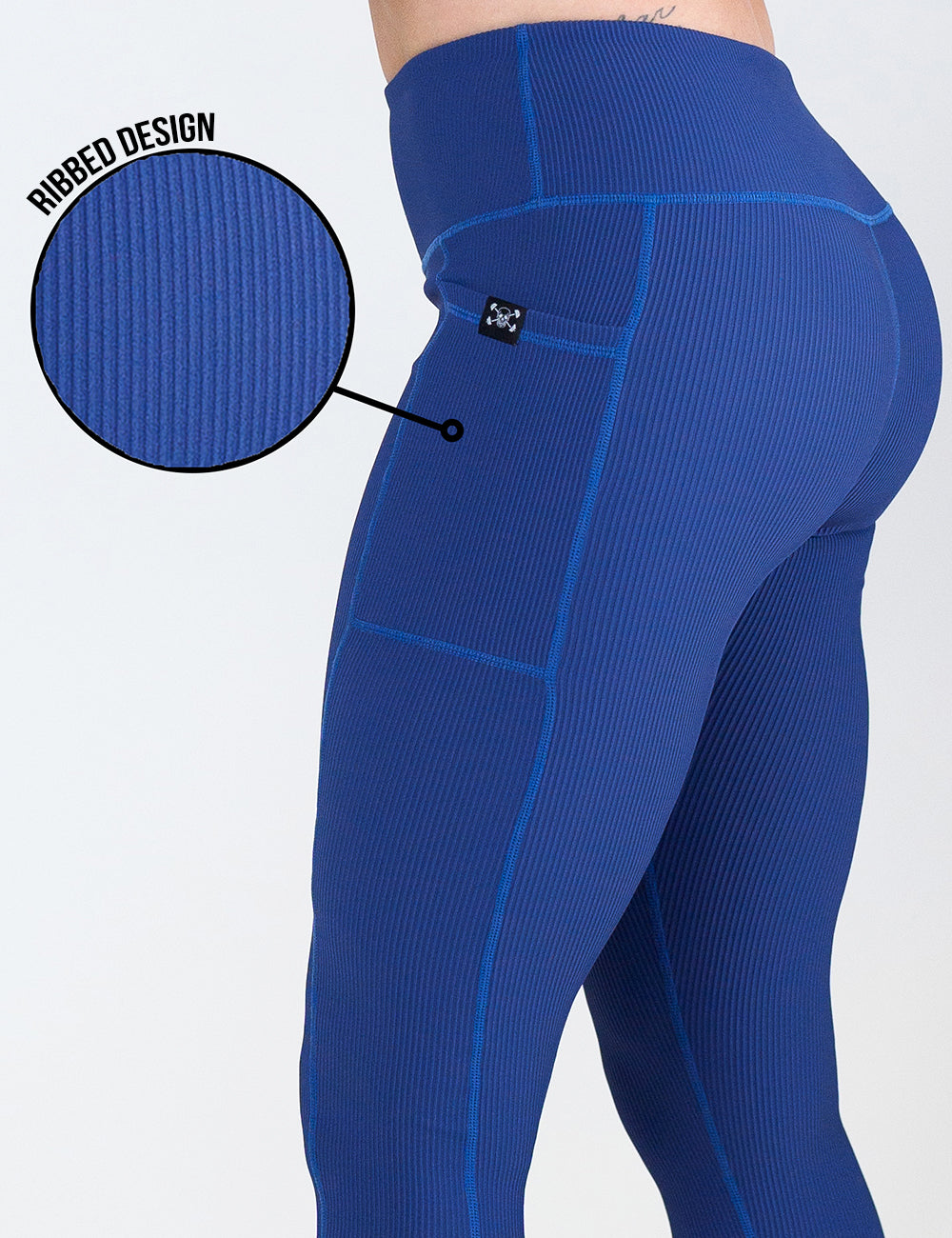 close up of the ribbed texture on the navy blue ribbed leggings