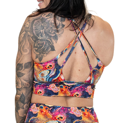 back view of colorful marble patterned sports bra 