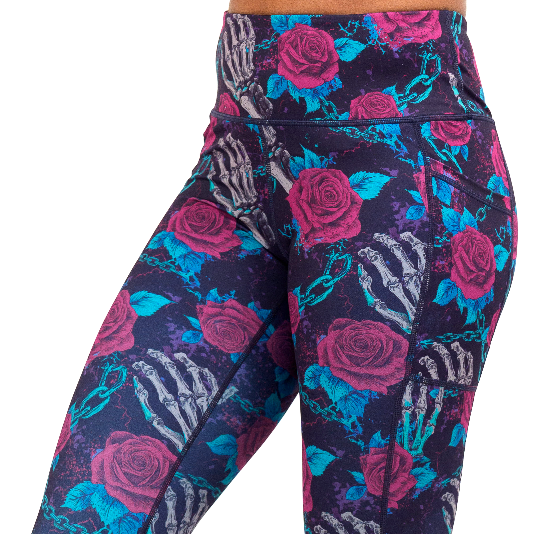 close up of the roses and skeleton hands connected by chain links pattern leggings against a white background