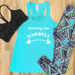 saved by the barbell graphic on teal racerback tank top