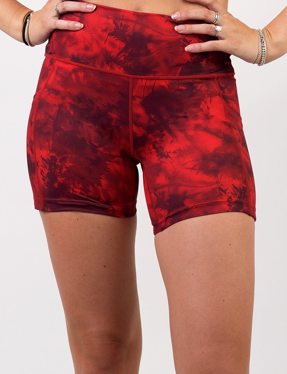front of the 5 inch red tie dye shorts against a white background