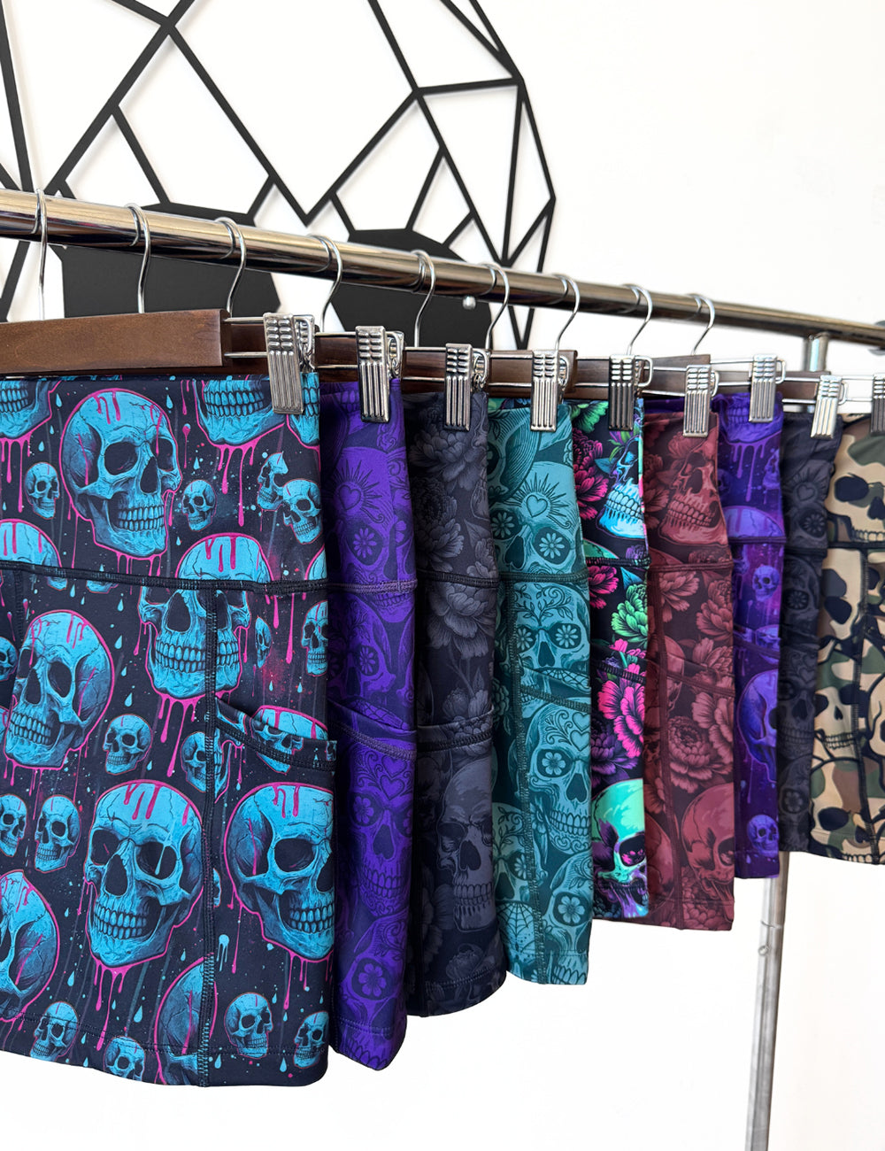 close up of the new sealed series shorts skull designs hanging on a rack