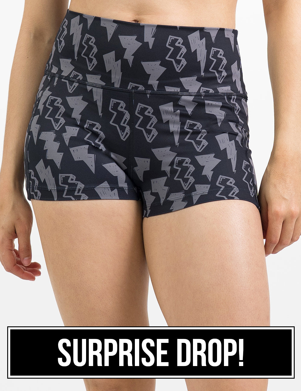 front of the black 2.5 inch shorts with grey lightning bolts against a white background, surprise drop