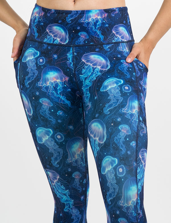 front of the blue jelly fish pattern leggings against a white background
