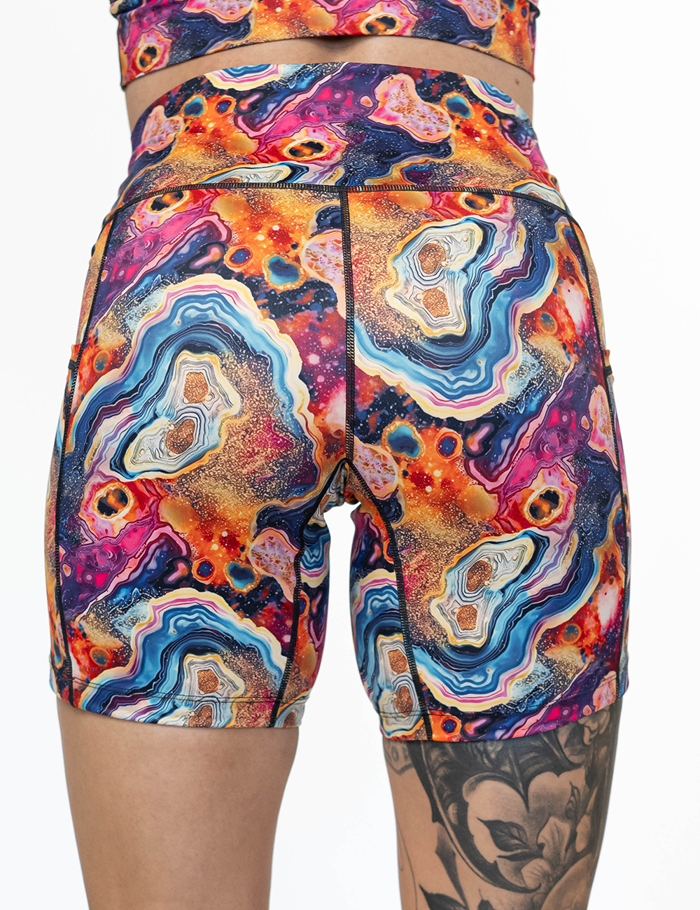 back of the 7 inch colorful granite shorts against a white background