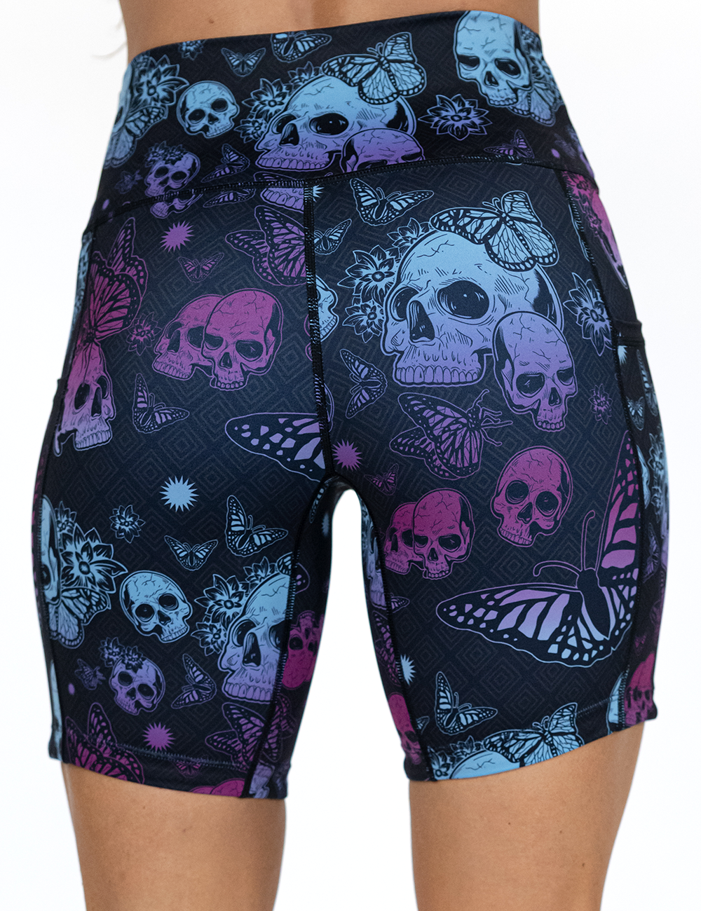 back of the 7 inch blue and purple skulls surrounded by butterflies against a white background