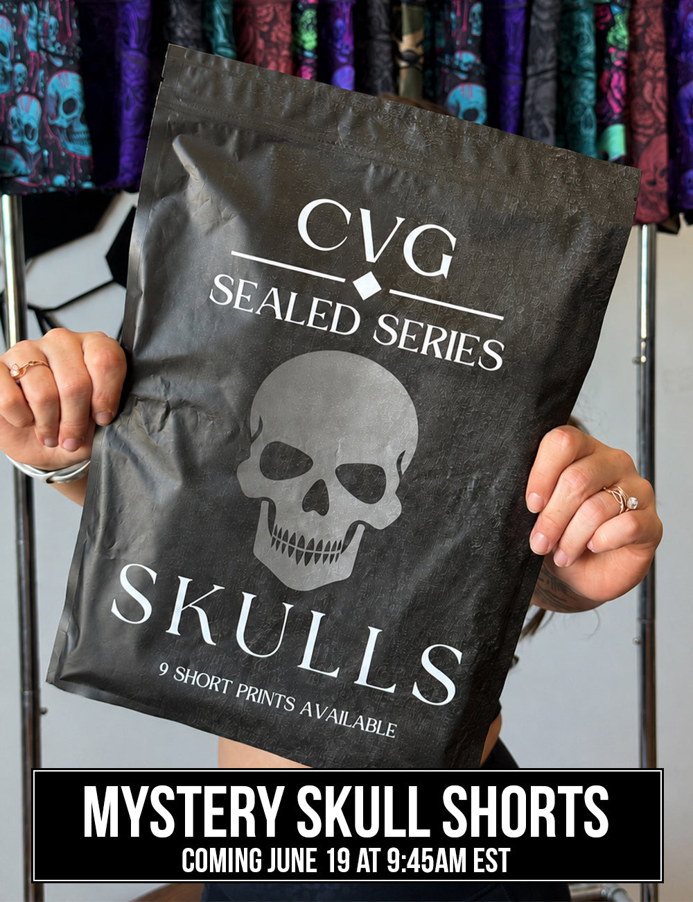 front of the CVG Sealed Series: Skulls Bag featuring a blacked out design with a grey skull in the middle, 9 shorts prints are available