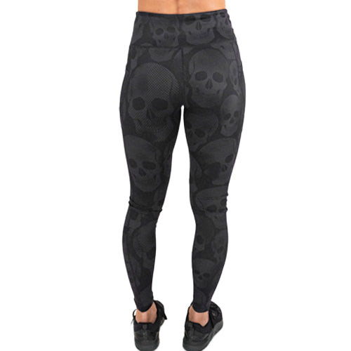 back of the black on black skull print leggings