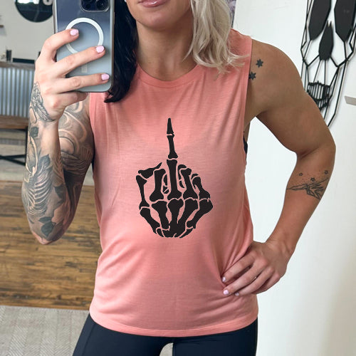 model wearing a peach colored tank top that has a skeleton middle finger on the center