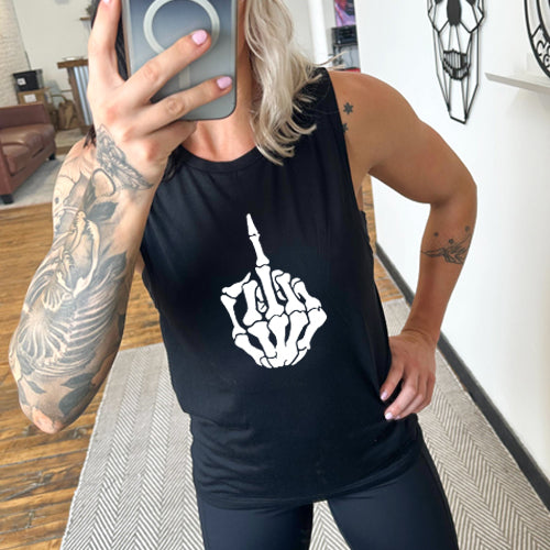 model wearing a black colored tank top that has a skeleton middle finger on the center