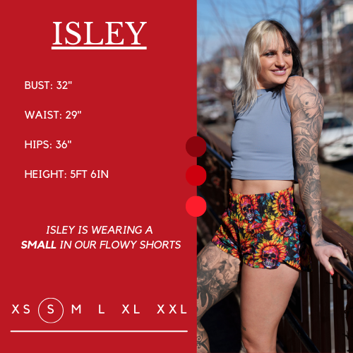 Model's measurements of 32 inch bust, 29 inch waist, 36 inch hips, and height of 5 foot 6 inches. She is wearing a size small in the shorts