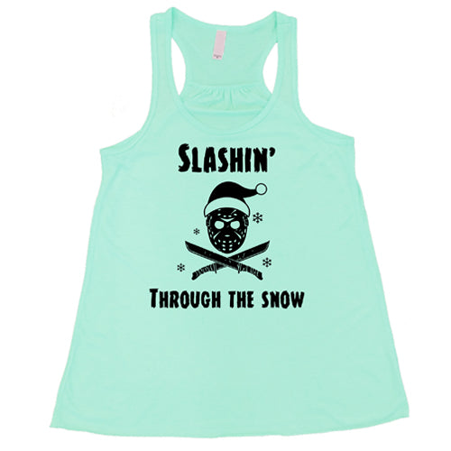 mint racerback tank top with black lettering that says "slashin through the snow"