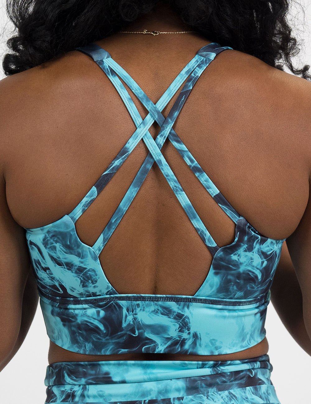 back of the blue smokey longline bra against a white background