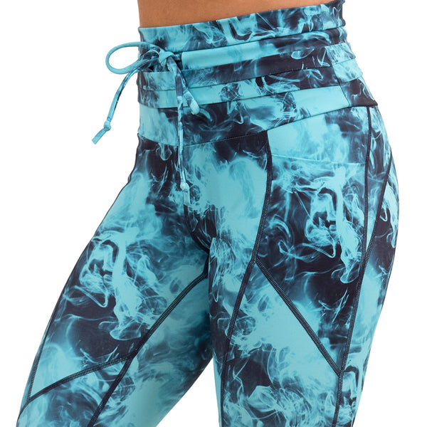close up of the blue smokey leggings against a white background