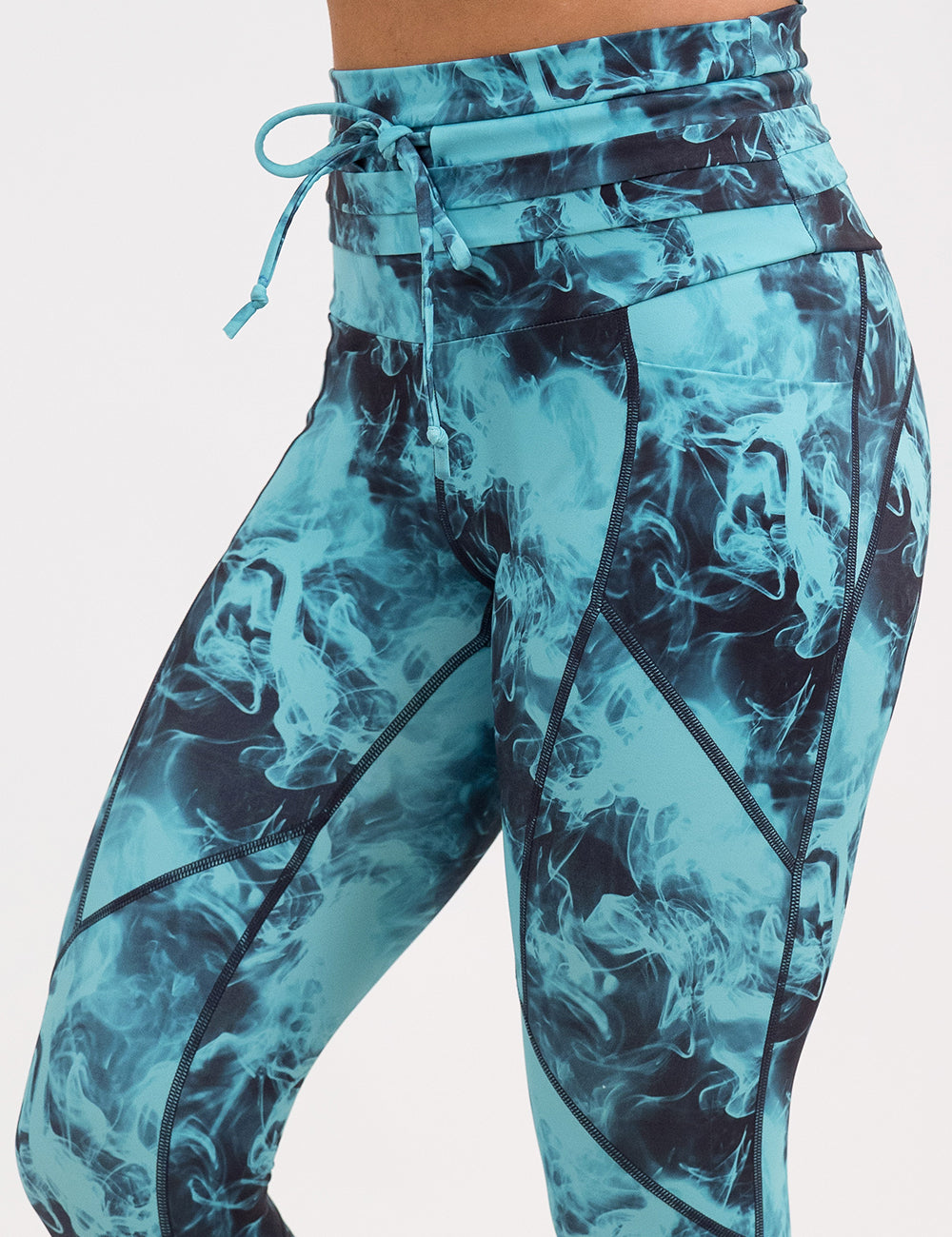close up of the blue smoke pattern leggings against a white background