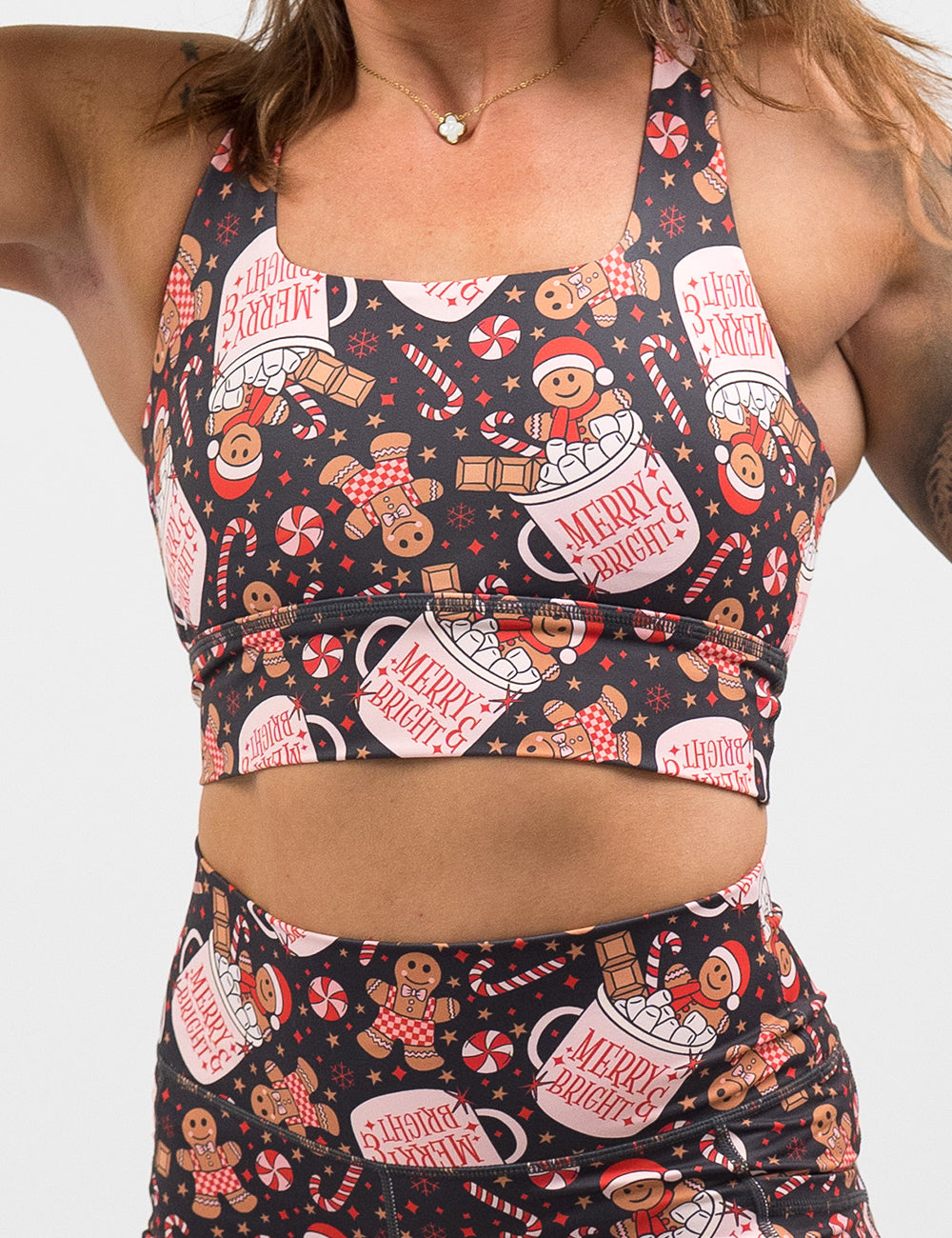 front of the Christmas-themed bra with gingerbread men and candy canes