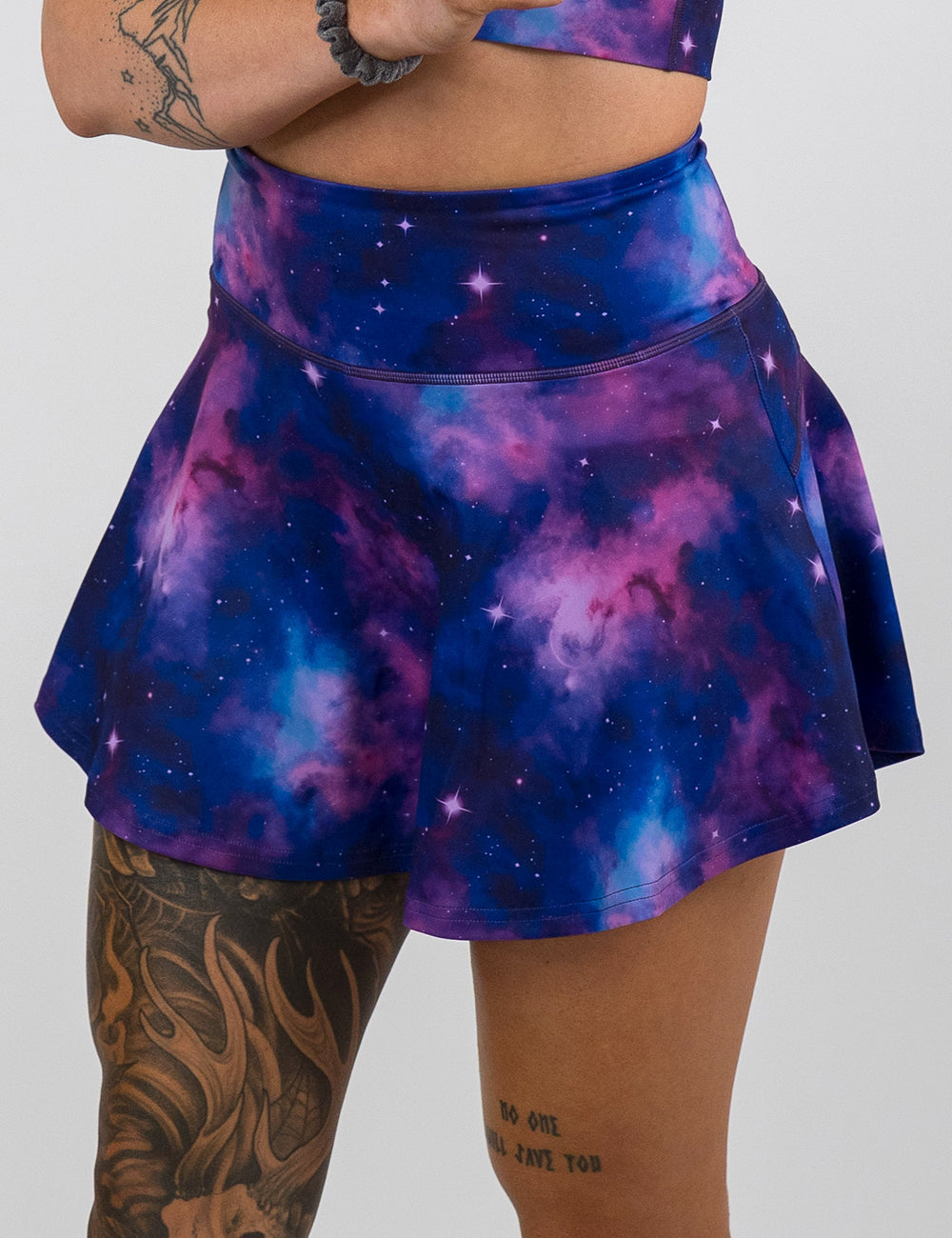 front of the purple and blue cosmos pattern regular length skirt against a white background