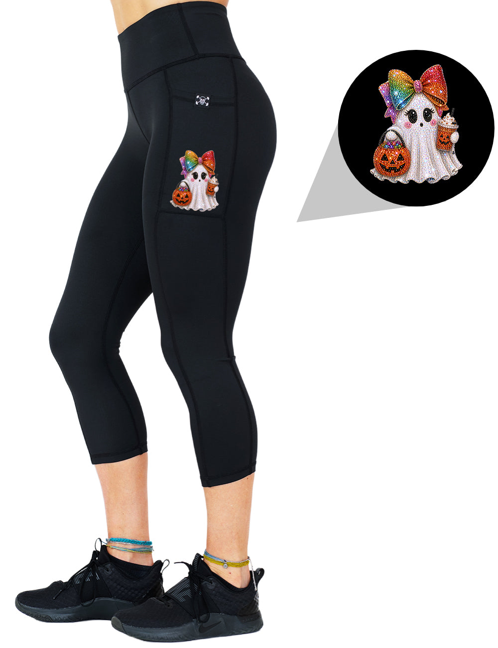 front of the bedazzled ghost with a bow graphic capri leggings