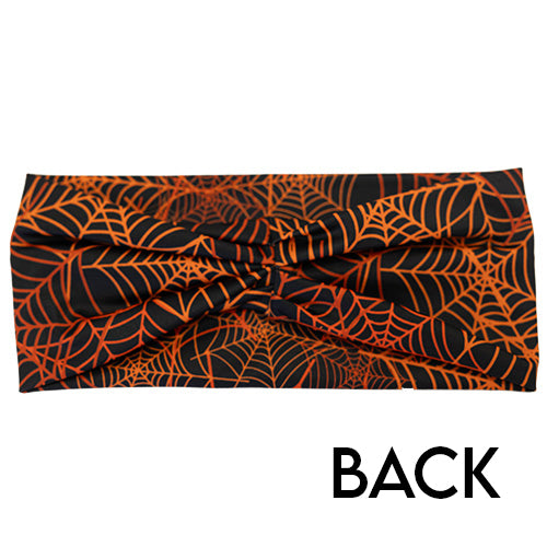 back of black and orange spider web headband