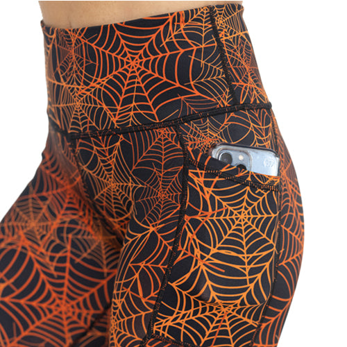 black and orange spider web leggings side pocket