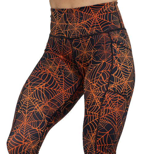 black and orange spider web leggings
