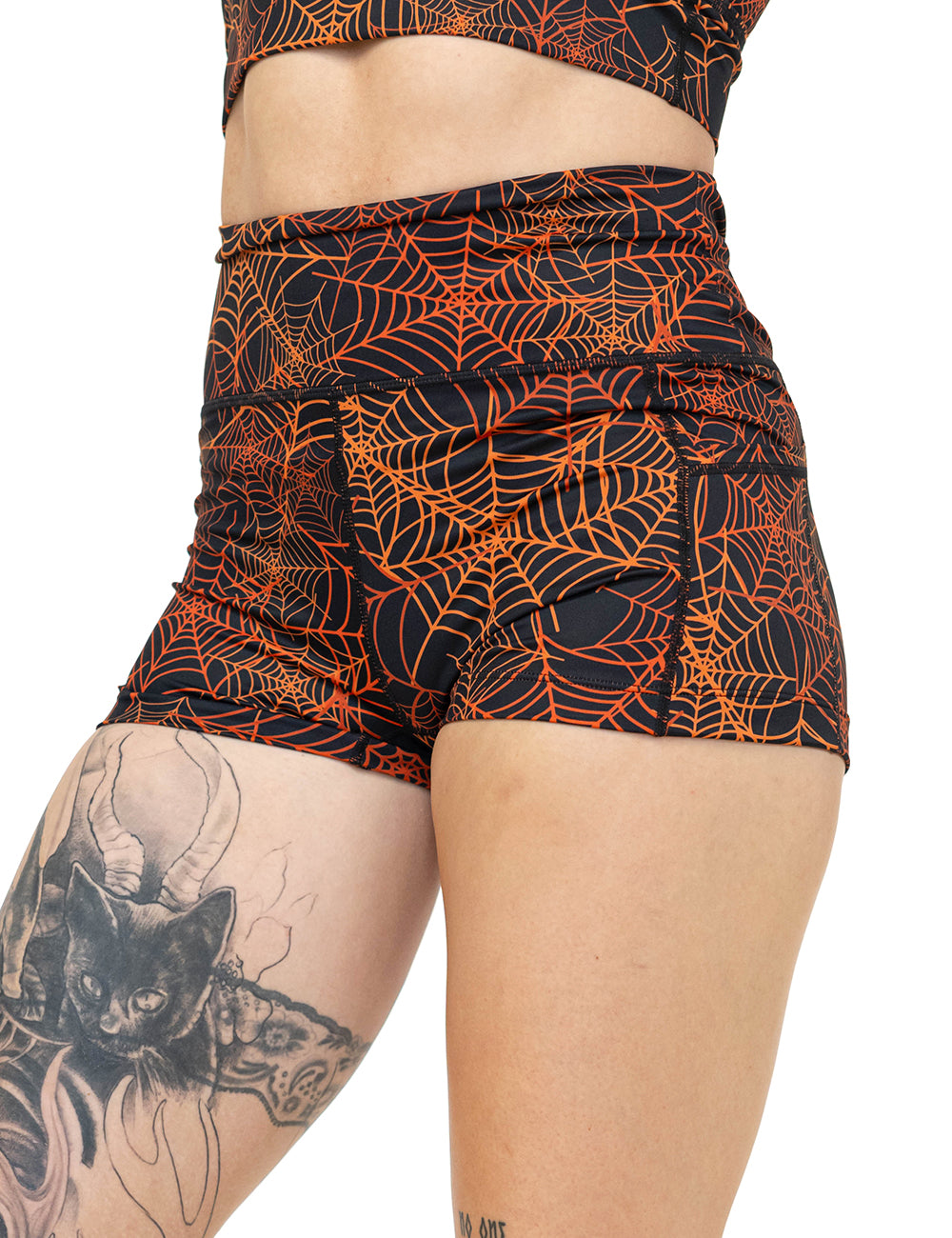 front of the orange spider webs against a black background 2.5 inch shorts against a white background
