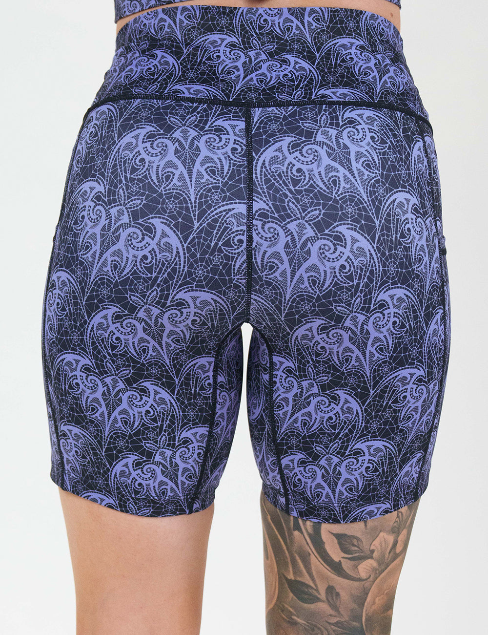 back of the 7 inch purple bat lace shorts against a white background