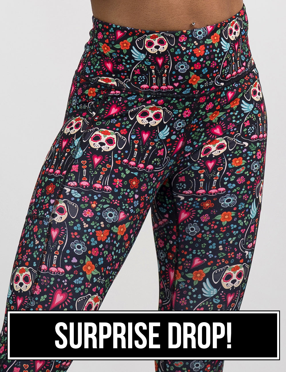 front of the skeleton dogs surrounded by flowers leggings suprise drop