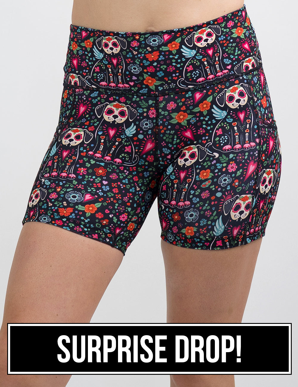 front of the skeleton dogs surrounded by flowers 5 inch shorts, surprise drop