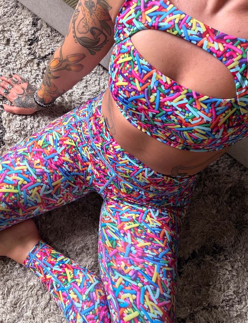 Selfie of a model wearing sprinkle matching set of leggings and bra