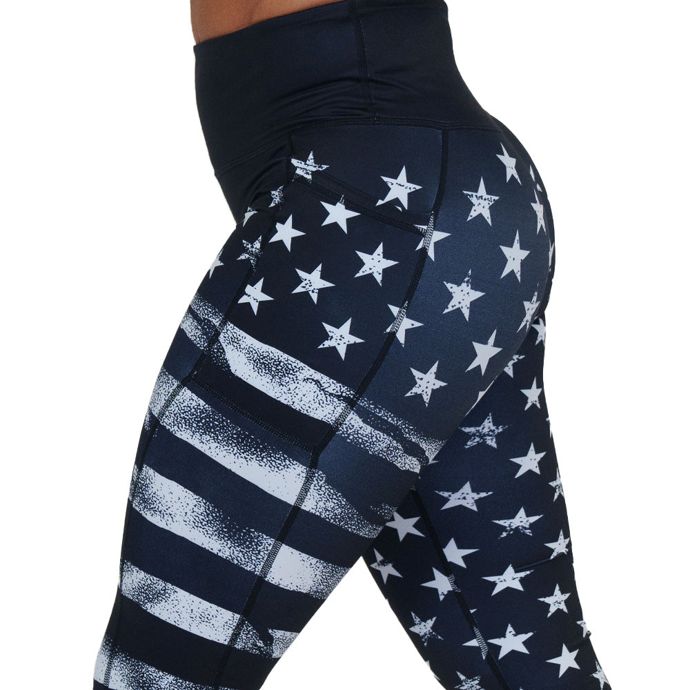 black leggings with white American flag design on it