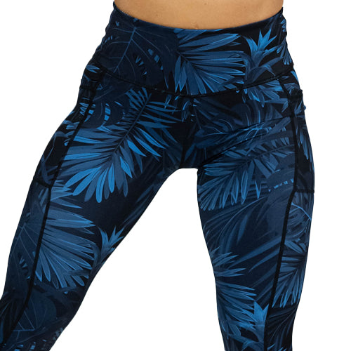 close up of blue palm leaf leggings