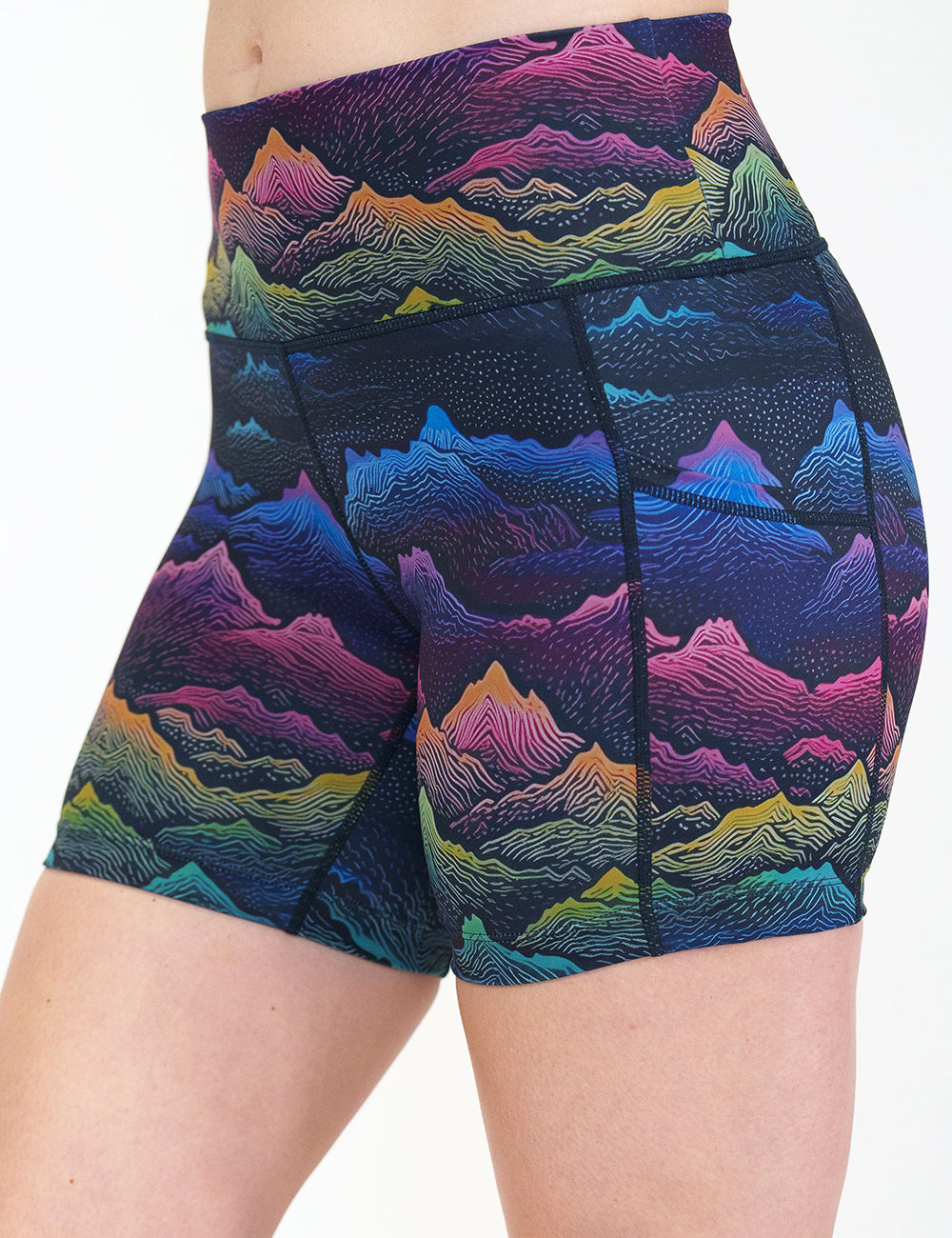 front of the 5 inch colorful mountain print shorts against a white background