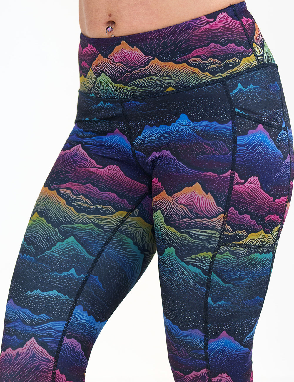 colorful mountain print leggings against a white background