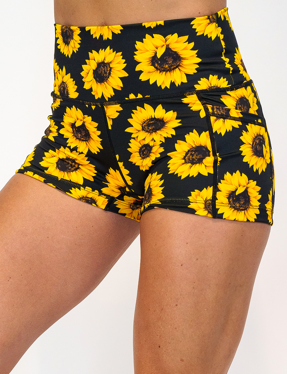 front of the 2.5 inch yellow flower shorts against a white background