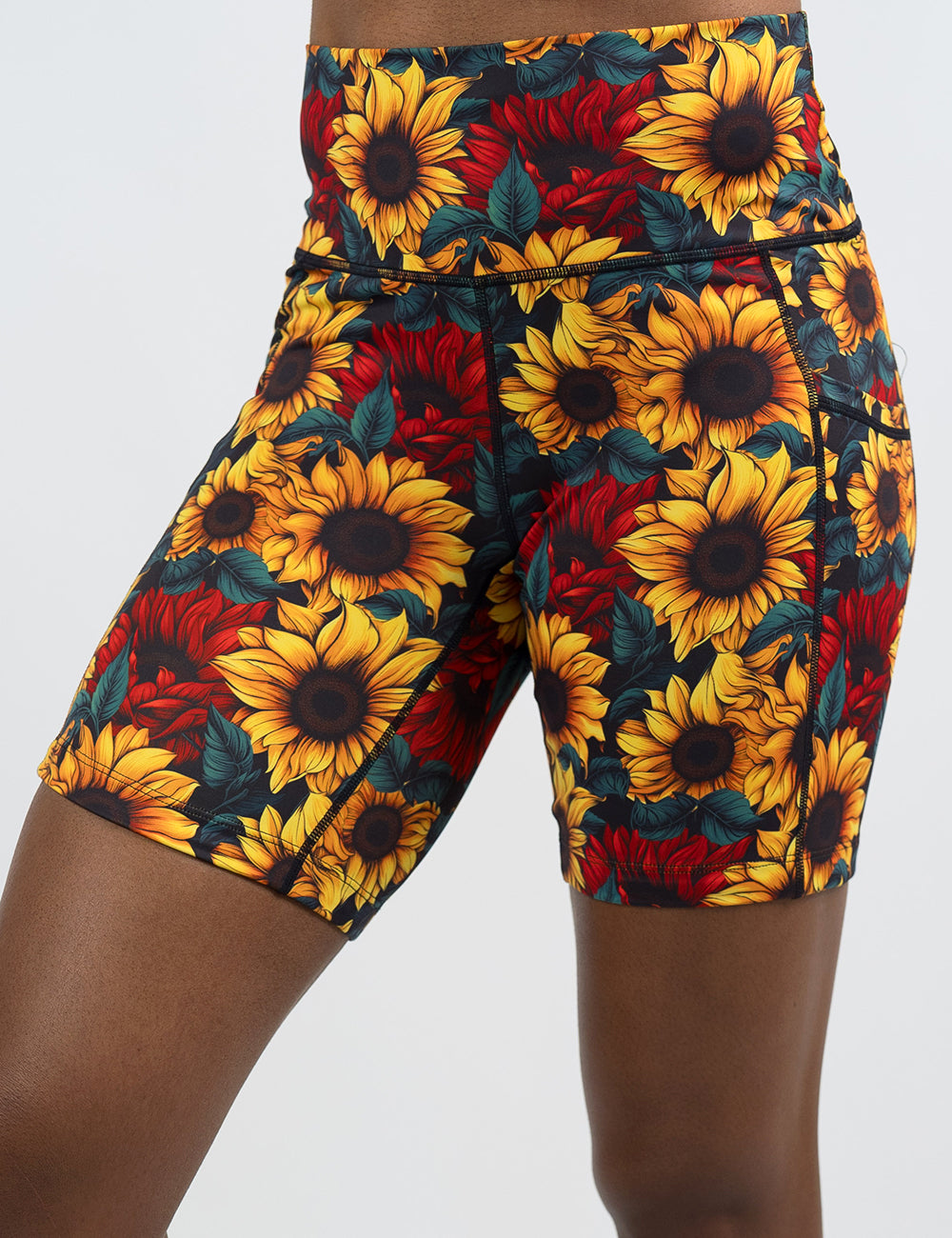 front of the 7 inch sunflower with red flowers shorts against a white background