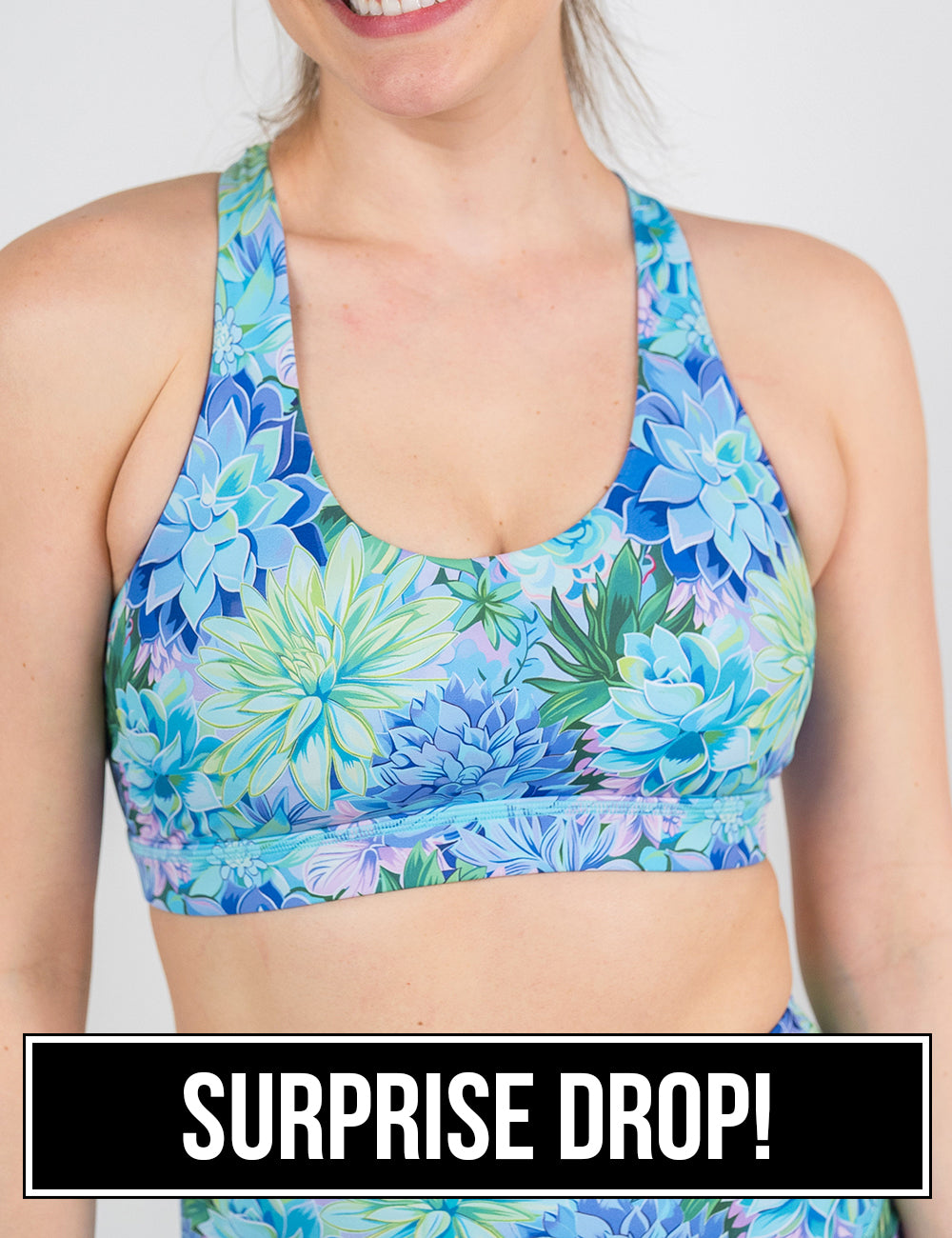 front of the blue flower pattern butterfly back bra against a white background, surprise drop