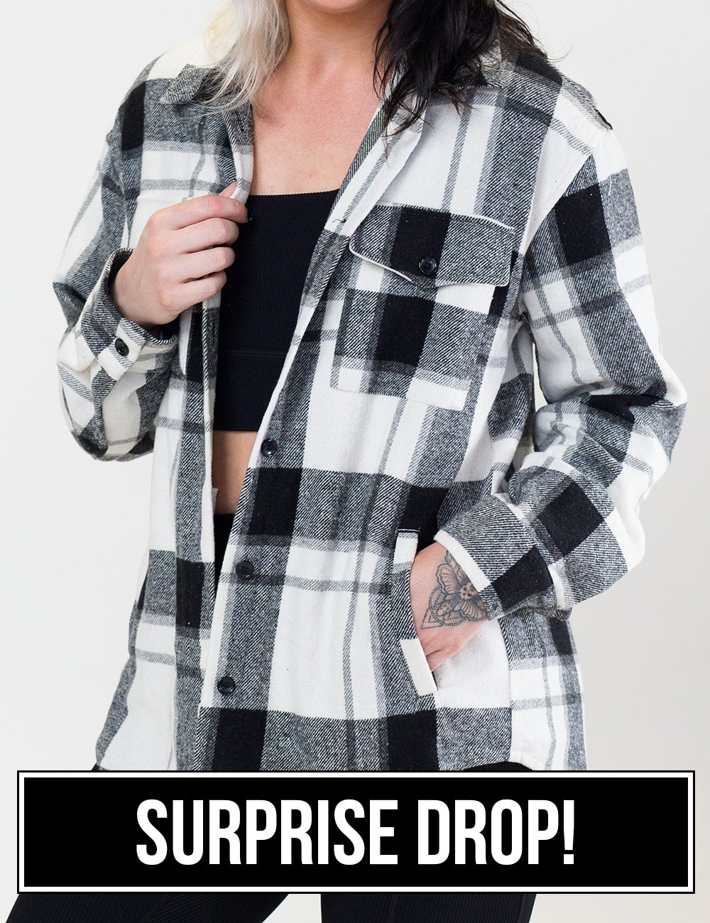 front of the black plaid shacket surprise drop