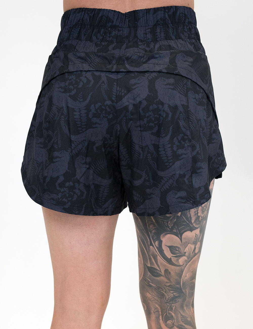 back of the 5 inch dark grey trex day dream shorts against a white background