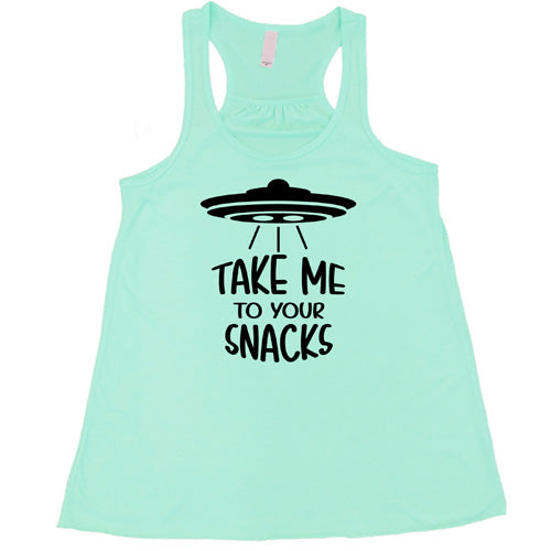 mint racerback tank top with a white quote on it that says "take me to your snacks" with a ufo on top of it