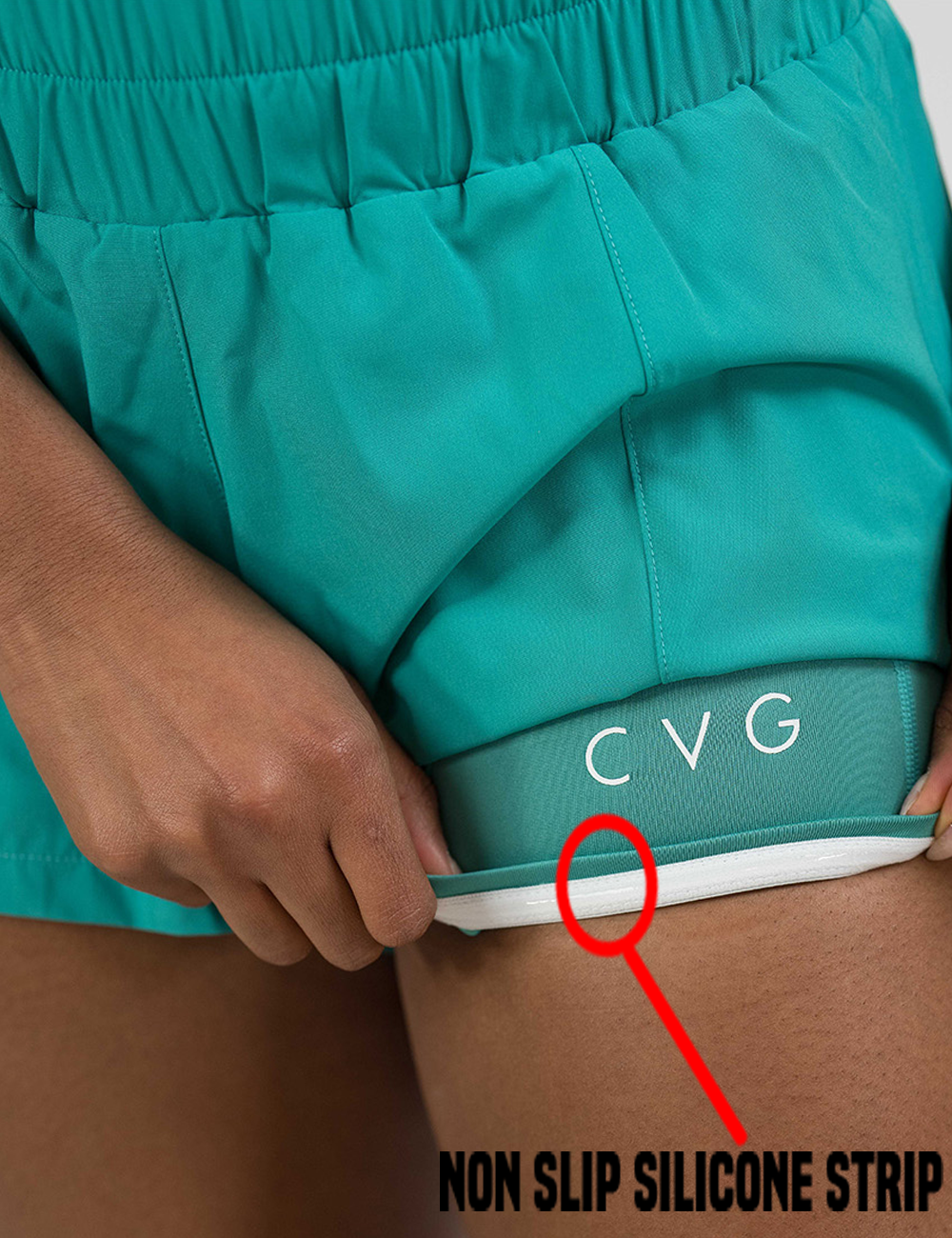 the teal day dream shorts lifted up to show the non slip silicone strip on the lining of the shorts