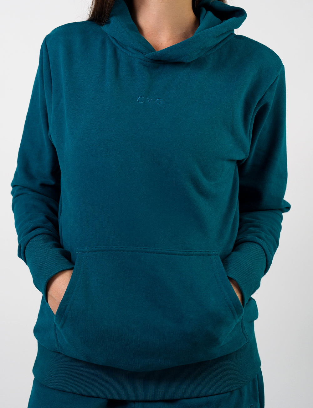 front of the dark blue hoodie with a subtle CVG logo