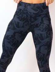 close up of dinosaur leggings